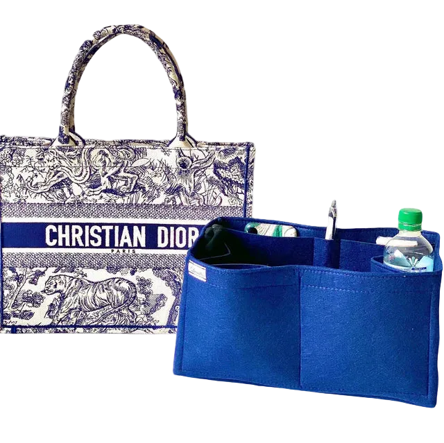 Blue bag organizer with a Christian Dior handbag in the background